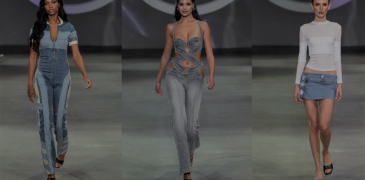 Three models walking down runway at fashion show
