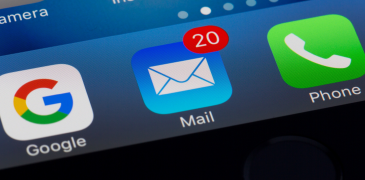 Google, Mail, and Phone app icons on iphone